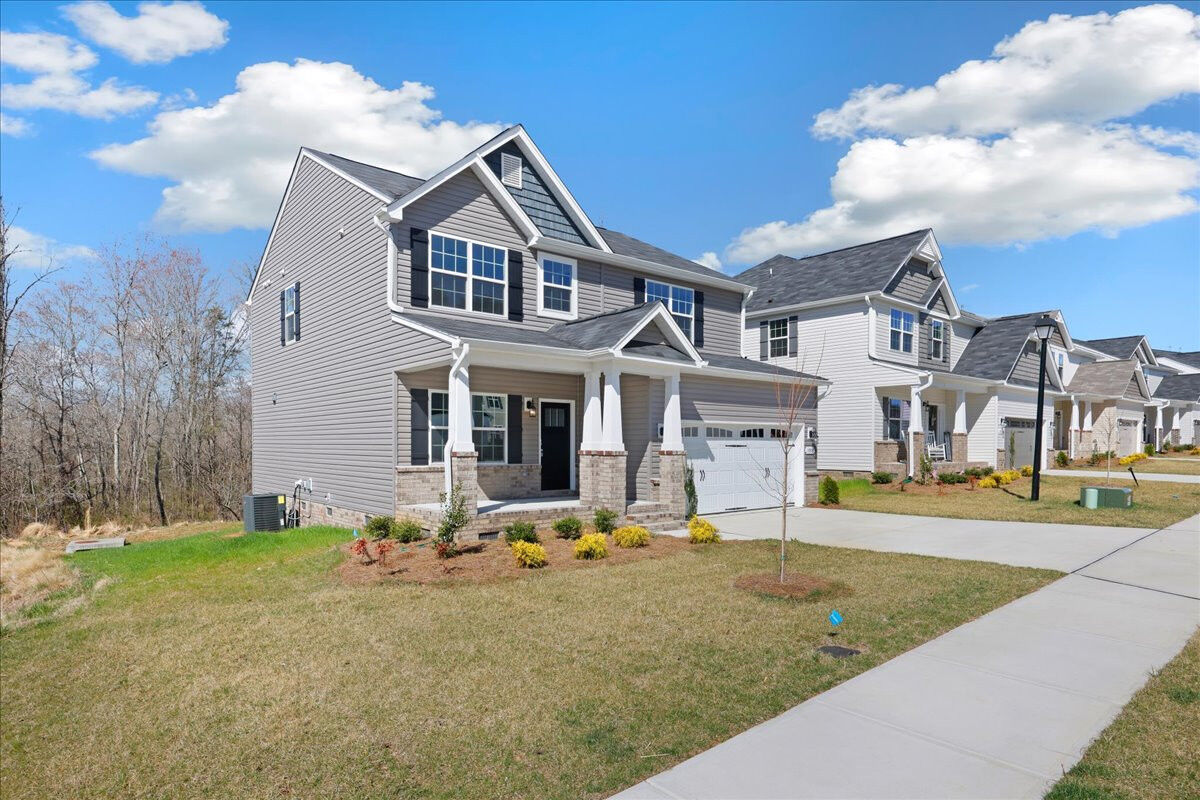 https://assets.windsorhomes.us/img/BCR_lot1_Cameron_elvB_1955_Kippen_Drive_exterior_Side.jpg