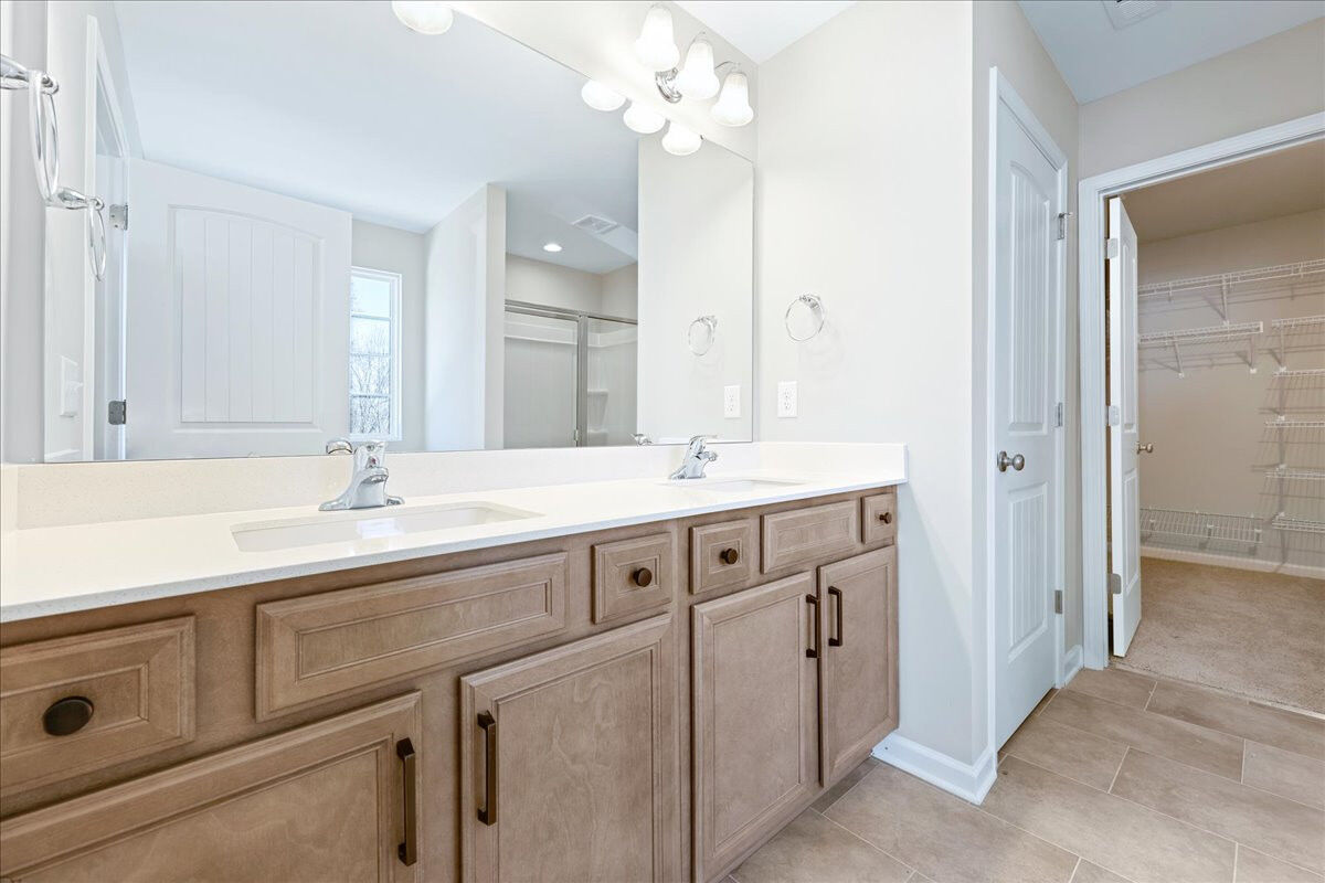 https://assets.windsorhomes.us/img/BCR_lot1_Cameron_elvB_1955_Kippen_Drive_primary_bath.jpg