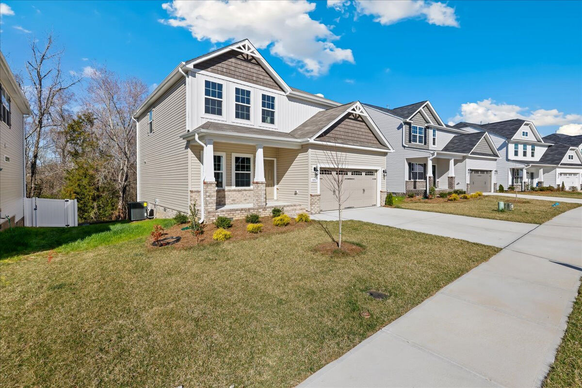 https://assets.windsorhomes.us/img/BCR_lot3_Cameron_elvC_1951_Kippen_Drive_exterior_Side.jpg