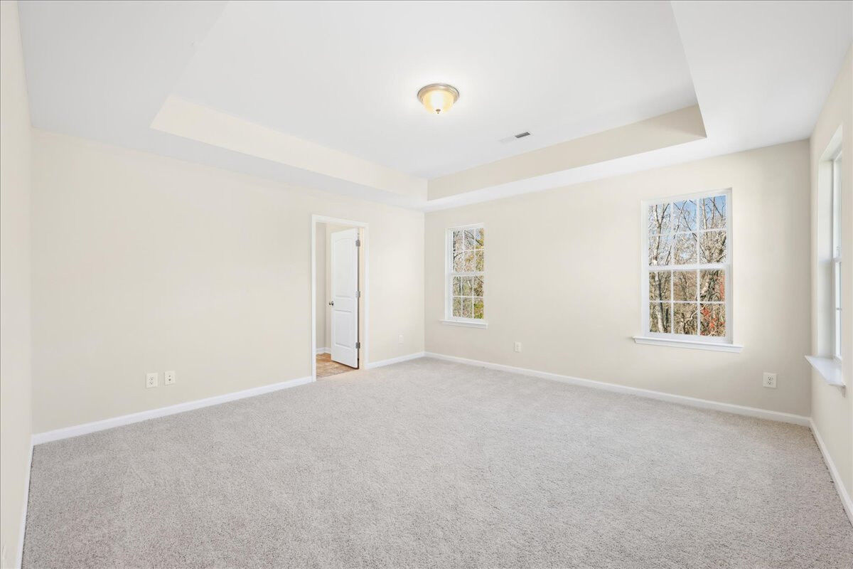 https://assets.windsorhomes.us/img/BCR_lot3_Cameron_elvC_1951_Kippen_Drive_primary_suite.jpg