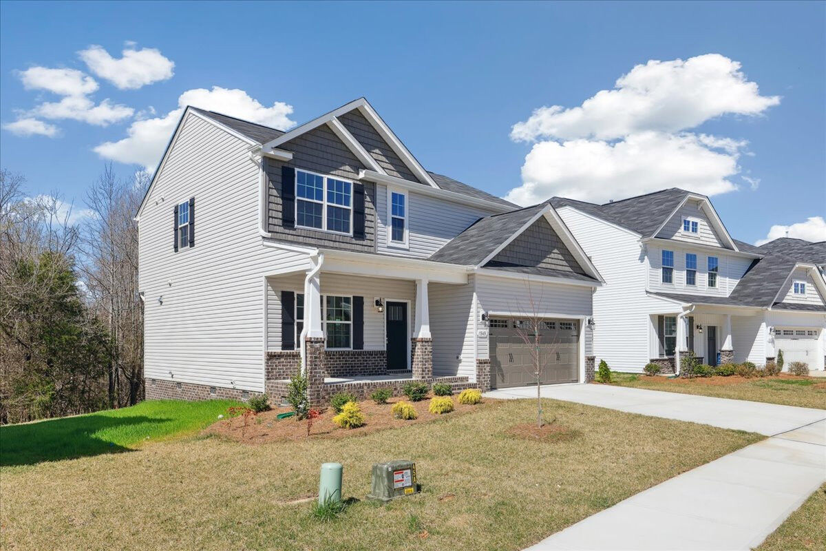 https://assets.windsorhomes.us/img/BCR_lot4_Stoddard_elvF_1949_Kippen_Drive_exterior_side.jpg