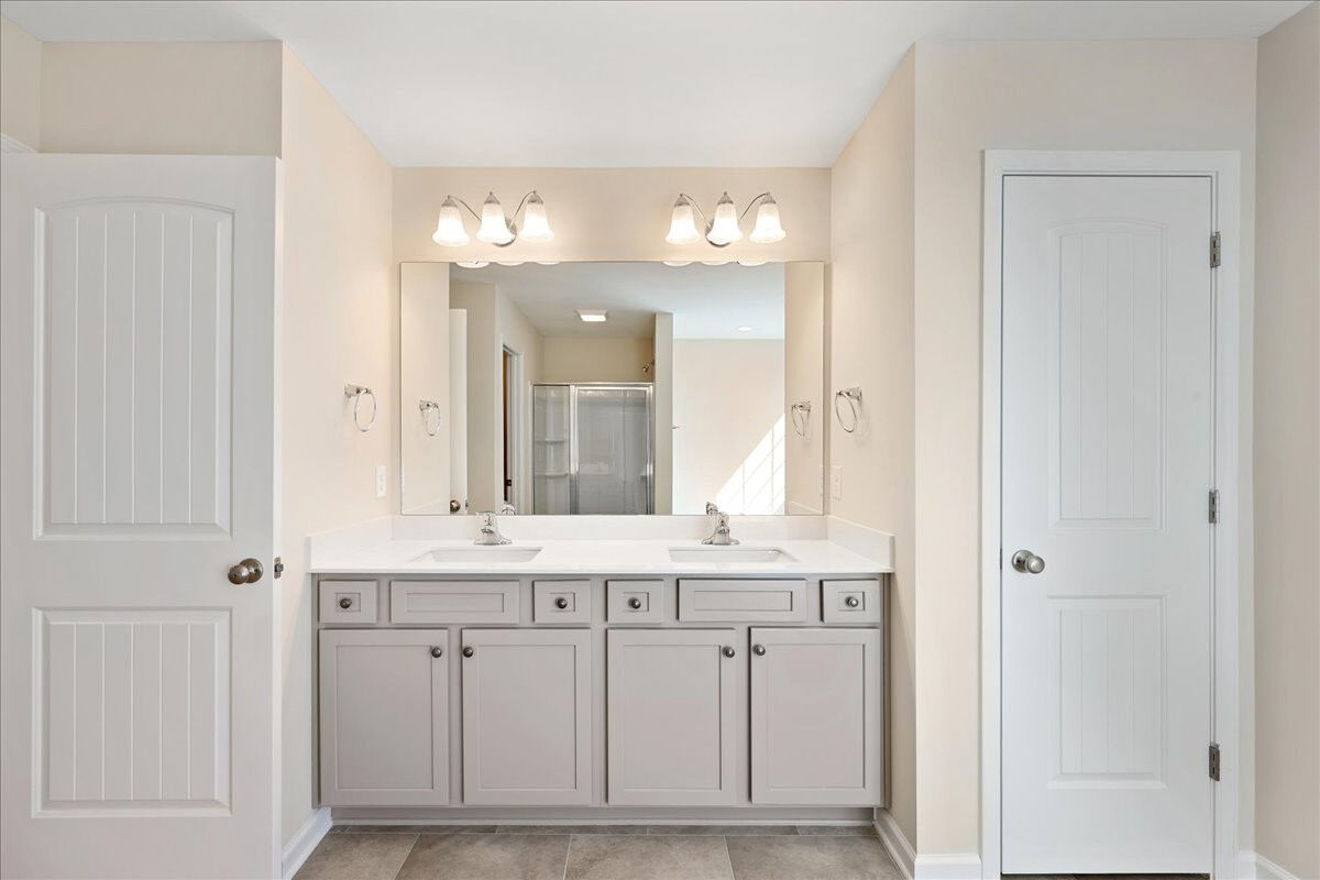 https://assets.windsorhomes.us/img/BCR_lot83_Lexington_elvE_1952_Kippen_Drive_primary_bath.jpg