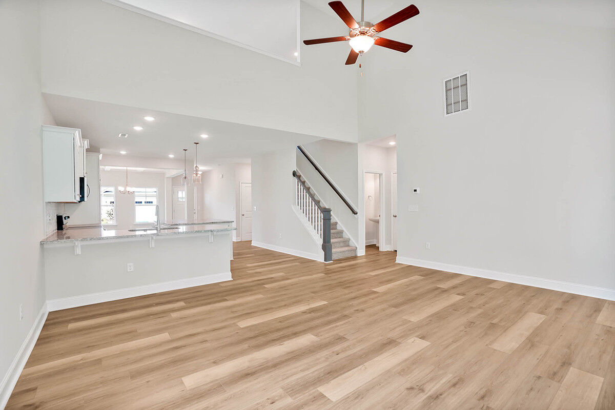 https://assets.windsorhomes.us/img/BMW_lot_22_Richmond_A_844_Red_Sky_Dr_NE_great_room_2.jpg