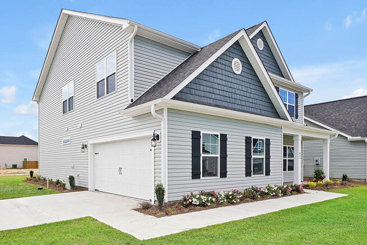 https://assets.windsorhomes.us/img/BMW_lot_29_Seagrove_D_835_Red_Sky_Drive_NE_Exterior_side.jpg