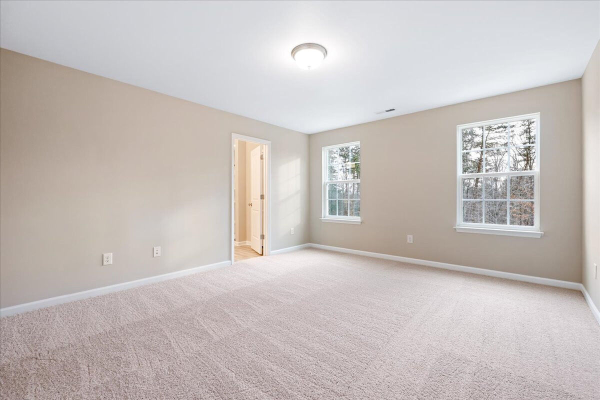 https://assets.windsorhomes.us/img/CCK_lot10_Columbia_elvA_1633_Appoloosa_Place_primary_suite_4.jpg