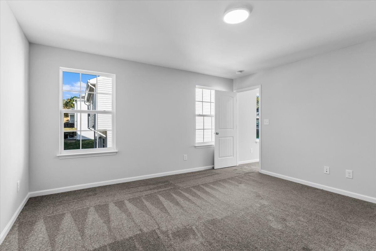 https://assets.windsorhomes.us/img/CCK_lot19_Cameron_elvB_4095_Stallion_St_primary_bedroom_2.jpg
