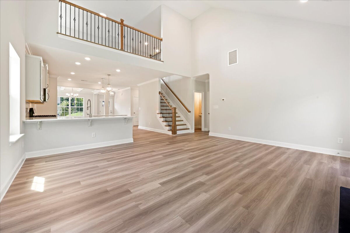 https://assets.windsorhomes.us/img/CCK_lot76_Richmond_elvB_4098_Stallion_Street_great_Room.jpg