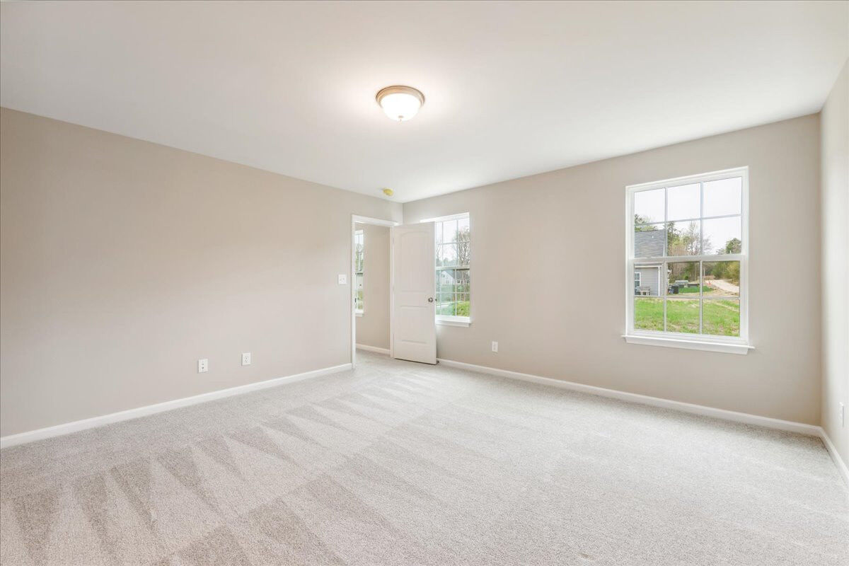 https://assets.windsorhomes.us/img/CCK_lot81_Cameron_elvA_4118_Stallion_street_primary_suite_2.jpg