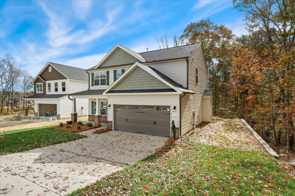 https://assets.windsorhomes.us/img/CCK_lot9_Stoddard_E_1637_Appaloosa_Place_exterior_side.jpg