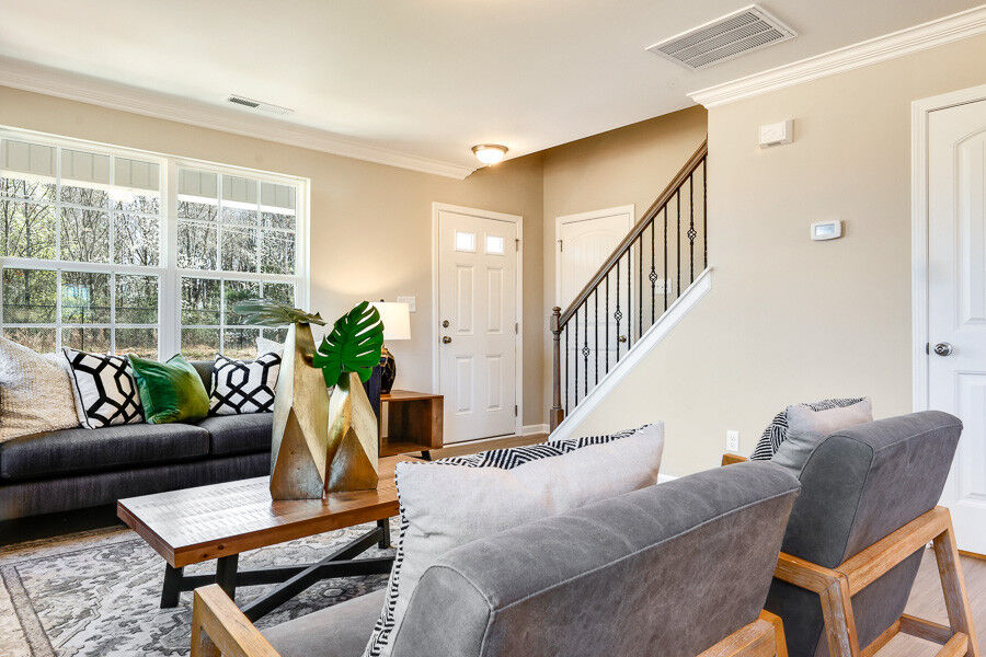 https://assets.windsorhomes.us/img/Indiana_A_VSC_lot1_4003_Straw_Hat_rd_great_Room.jpg