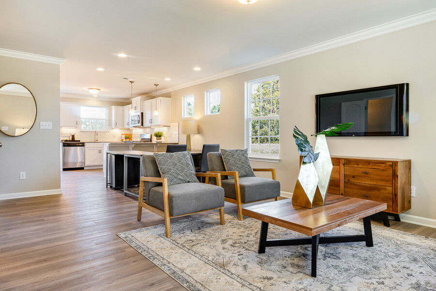 https://assets.windsorhomes.us/img/Indiana_A_VSC_lot1_4003_Straw_Hat_rd_great_room_2.jpg