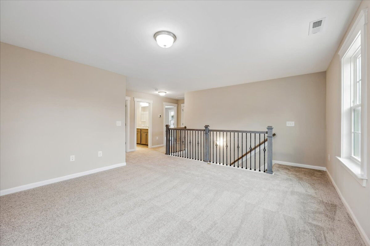 https://assets.windsorhomes.us/img/KL_Lot95_Bailey_elvF_1360_Reading_Ct_loft.jpg
