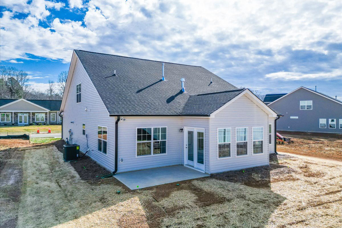 https://assets.windsorhomes.us/img/MG_Lot102_Pinehurst_C_1036_Fairhaven_Dr_exterior_Side_rear.jpg