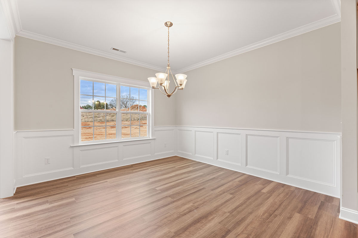 https://assets.windsorhomes.us/img/MLF_lot41_Pinehurst_elvB_112_Rocky_Maple_Drive_dining.jpg