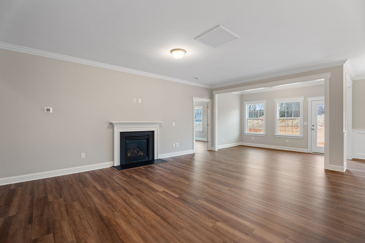 https://assets.windsorhomes.us/img/MLF_lot41_Pinehurst_elvB_112_Rocky_Maple_Drive_great_room.jpg