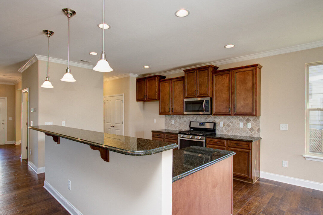 https://assets.windsorhomes.us/img/Montgomery_B_CSS_lot65_490-Olsen-Drive_kitchen.jpg