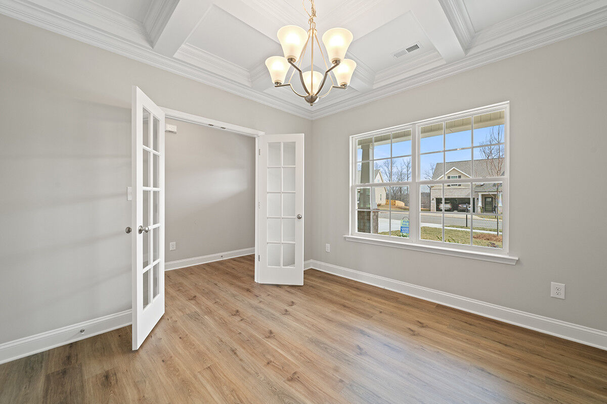 https://assets.windsorhomes.us/img/RP_lot64_Stoddard_elvF_4482_Olivine_Ln_dining_2.jpg