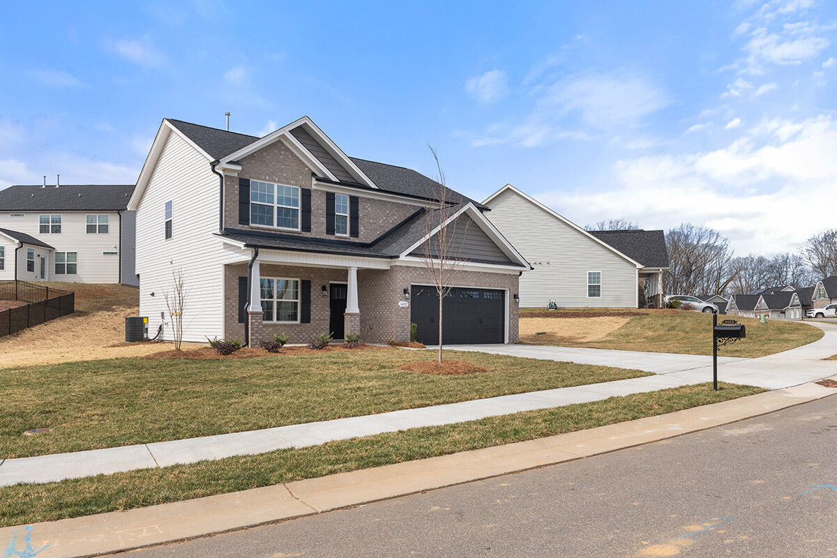https://assets.windsorhomes.us/img/RP_lot64_Stoddard_elvF_4482_Olivine_Ln_exterior_side_2.jpg