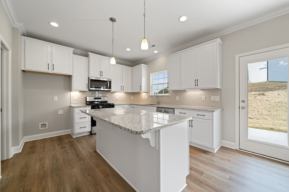 https://assets.windsorhomes.us/img/RP_lot64_Stoddard_elvF_4482_Olivine_Ln_kitchen_3.jpg