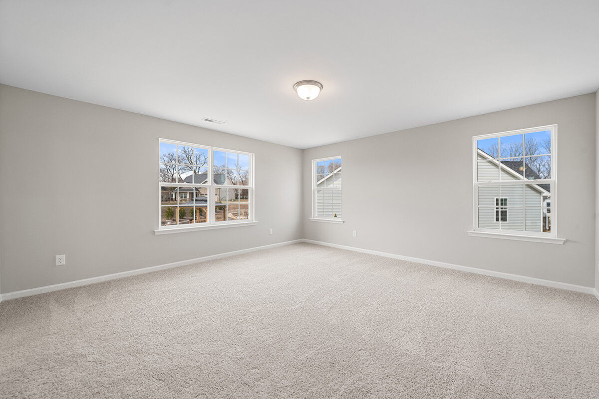 https://assets.windsorhomes.us/img/RP_lot64_Stoddard_elvF_4482_Olivine_Ln_primary_suite.jpg
