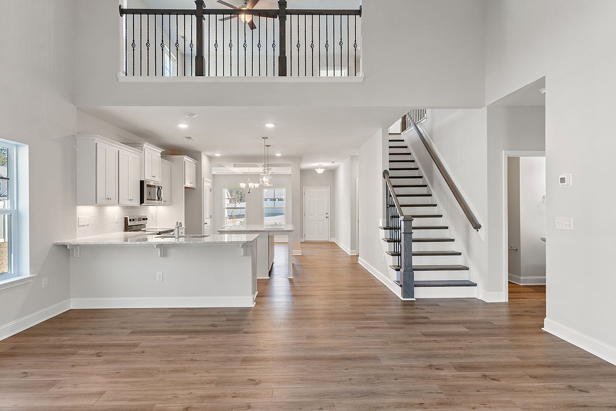 https://assets.windsorhomes.us/img/Richmond_C_RR_lot84_948_Billys_Dream_Circle_SW_great_room.jpg
