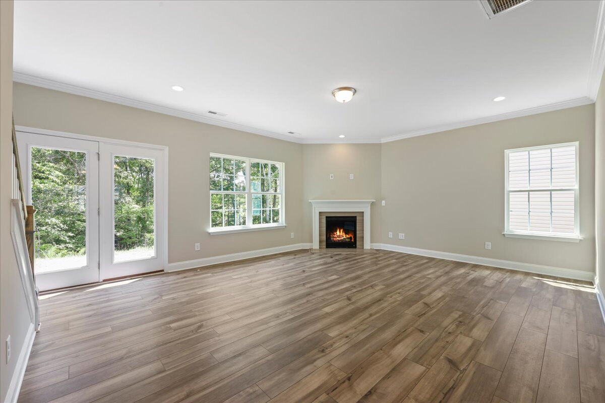 https://assets.windsorhomes.us/img/Somerser_B_CCK_lot88_4212_Canter_Creek_Lane_great_room.jpg