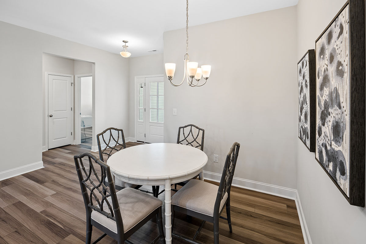 https://assets.windsorhomes.us/img/TT_lot19_Somerset_elvE_1018_Terraces_Ln_Dining.jpg