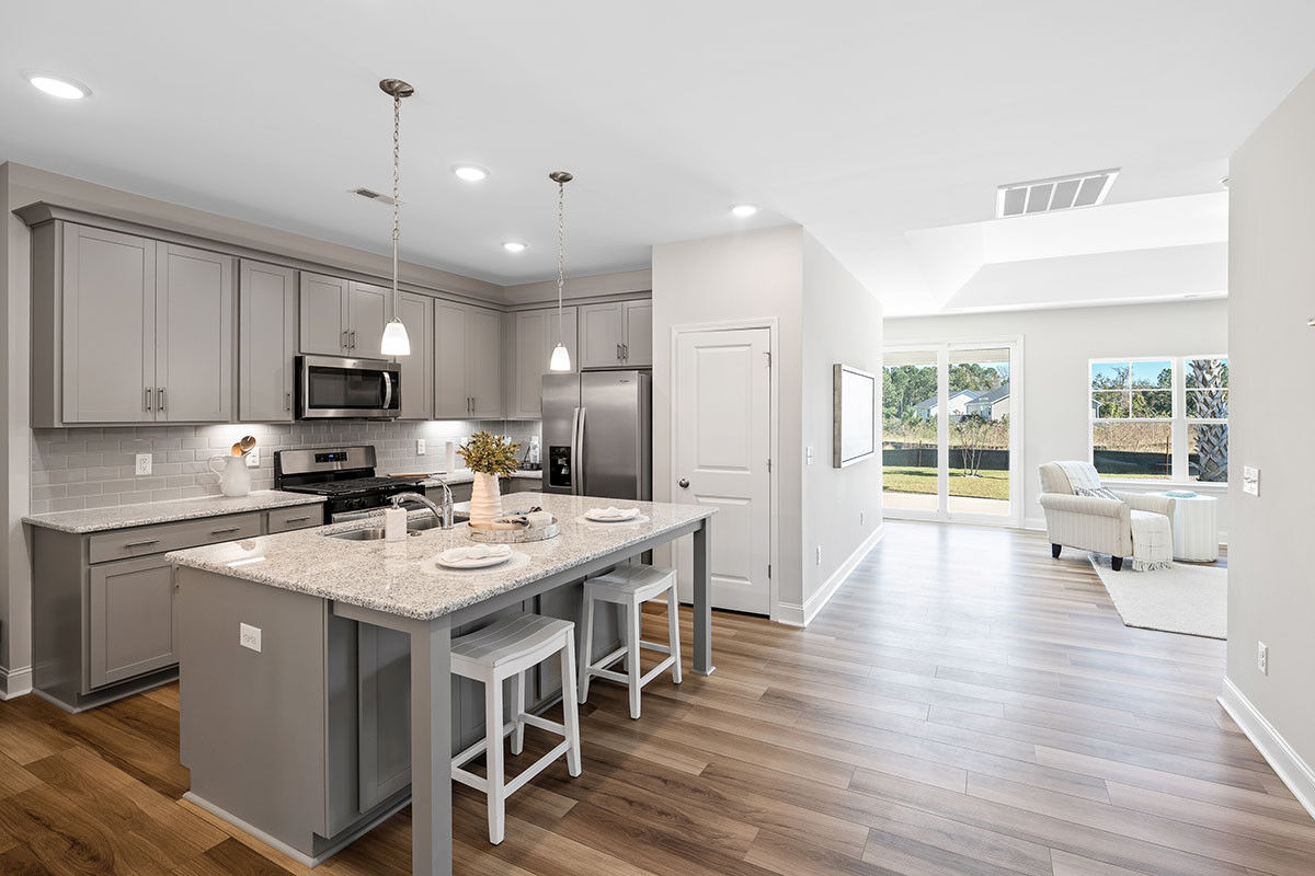 https://assets.windsorhomes.us/img/TT_lot19_Somerset_elvE_1018_Terraces_Ln_Kitchen.jpg
