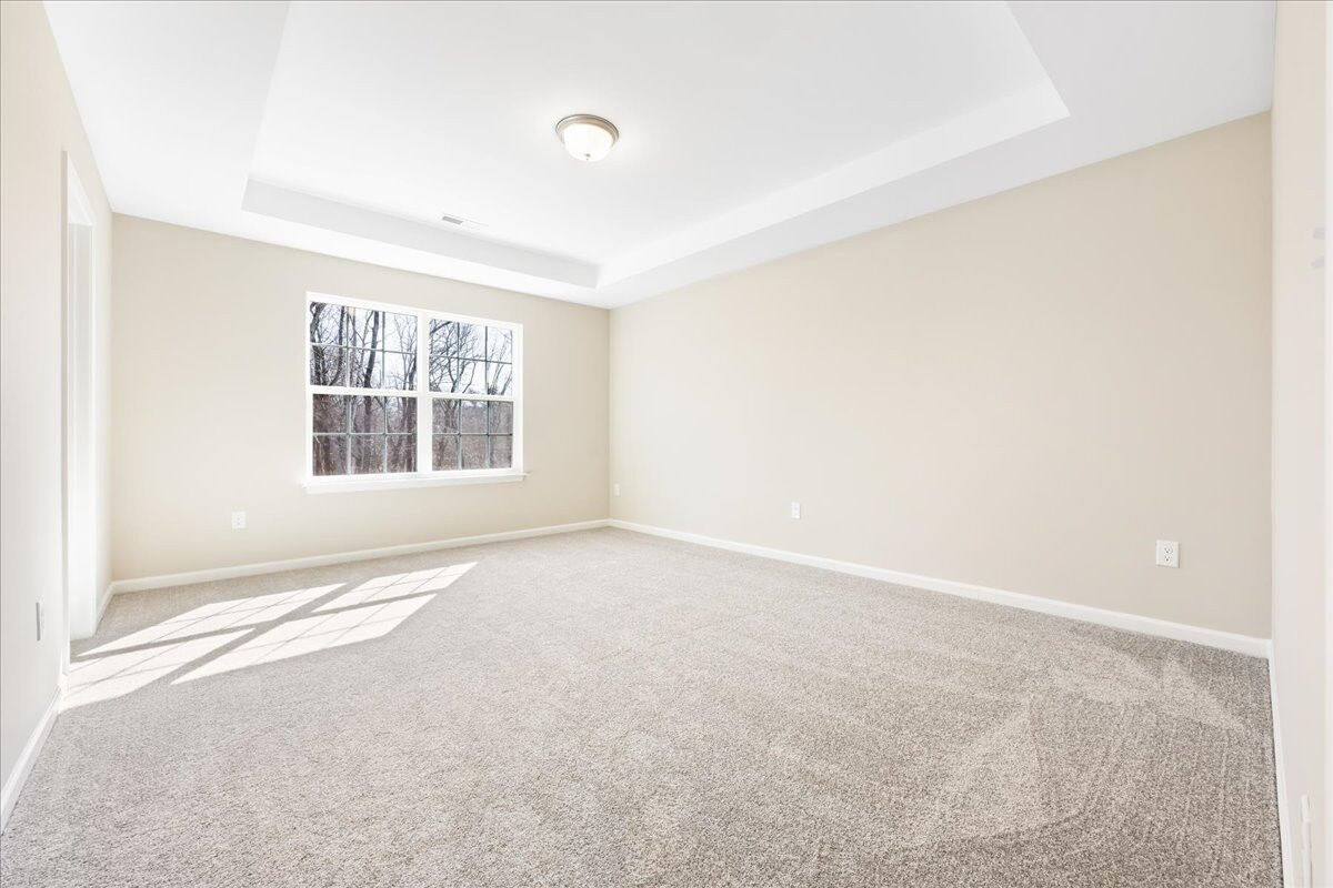 https://assets.windsorhomes.us/img/VR_lot11_Southport_elvA_1826_Parham_Drive_primary_suite.jpg
