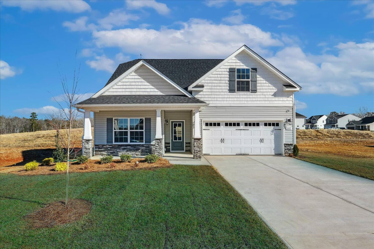 https://assets.windsorhomes.us/img/VR_lot84_Cary_elvC_207_Wildwood_Lane_exterior_full_front.jpg