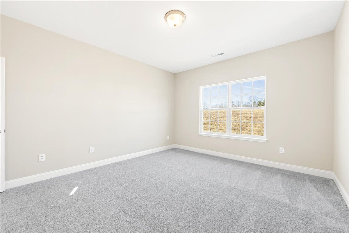 https://assets.windsorhomes.us/img/VR_lot84_Cary_elvC_207_Wildwood_Lane_primary_suite.jpg