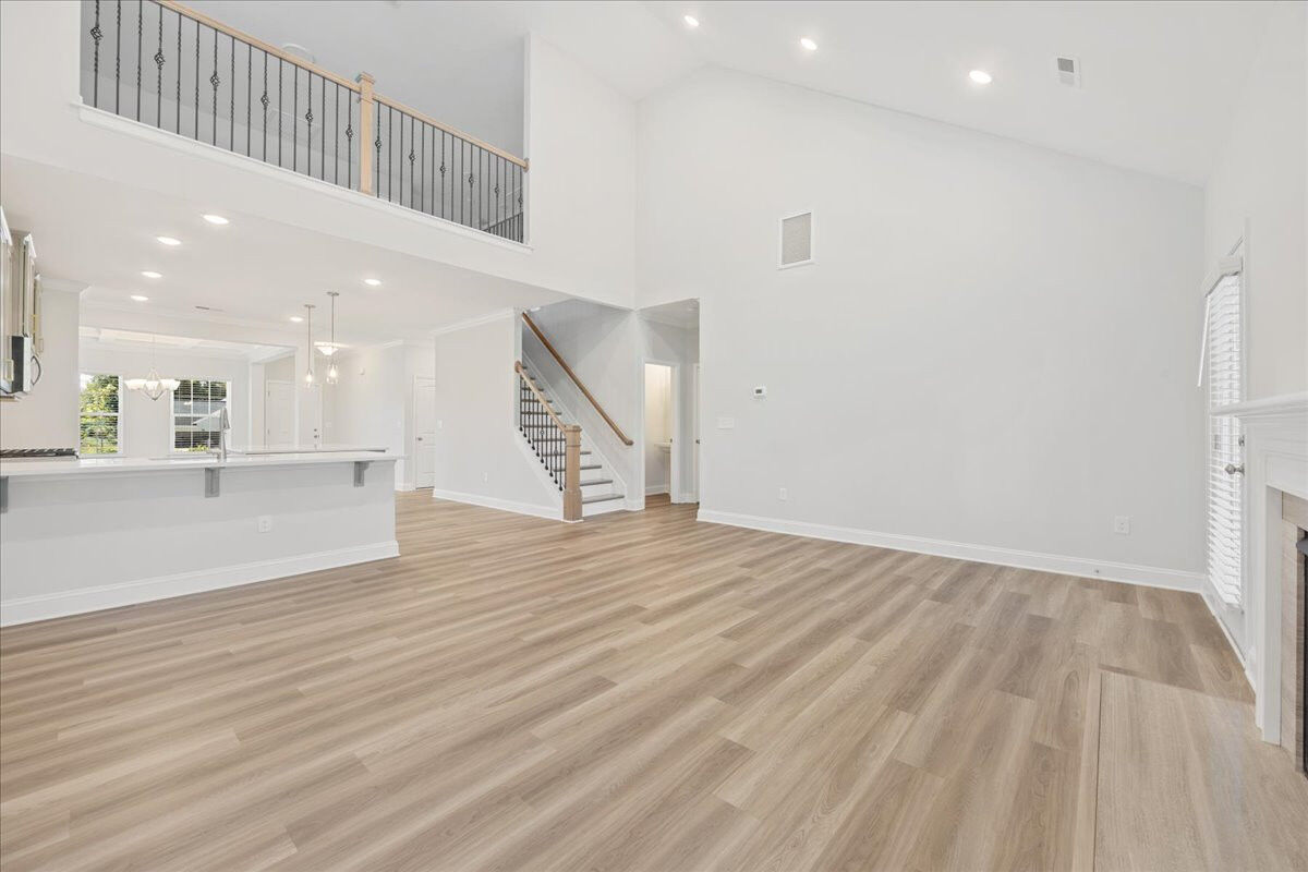 https://assets.windsorhomes.us/img/WP_lot1_Richmond_elvC_3301_Alyssa_Way_great_room_3.jpg